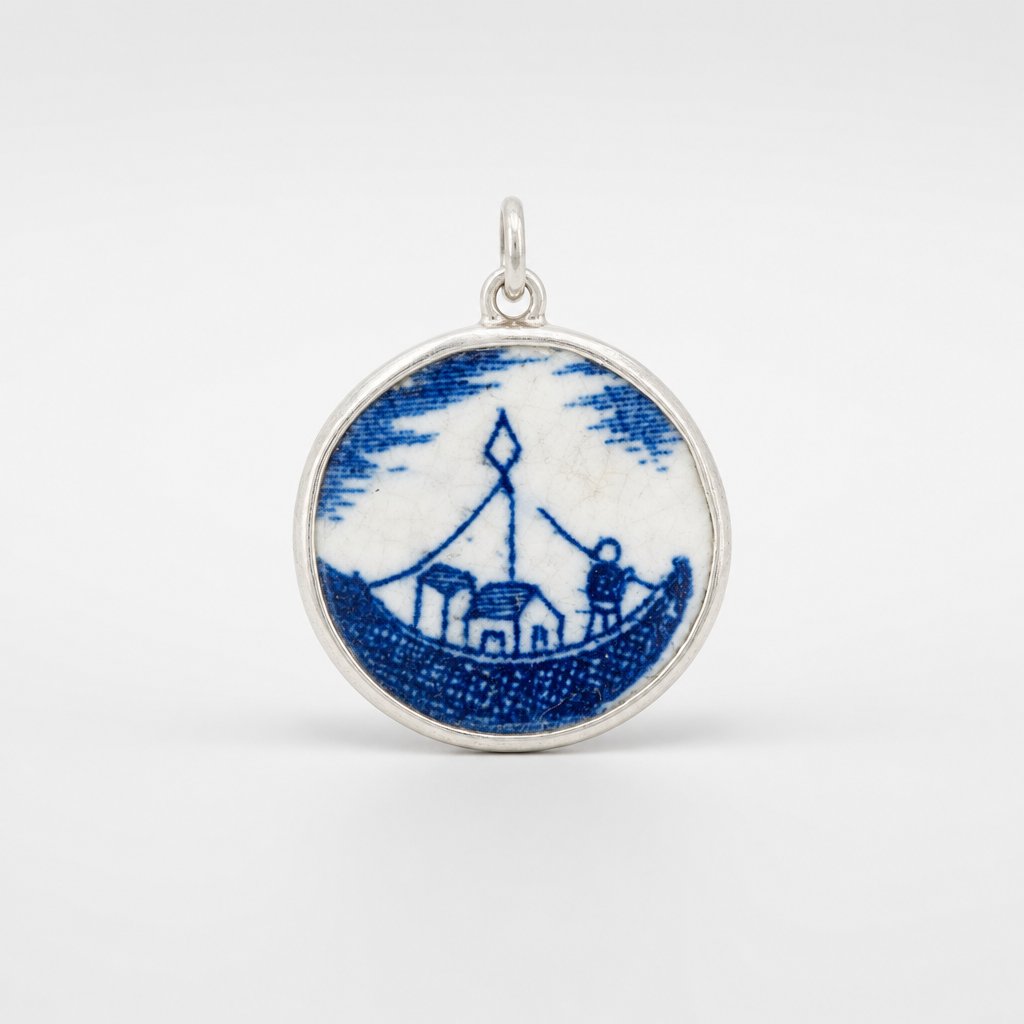 Blue and white willow pattern ceramic pendant - front view sterling silver bezel setting on chain