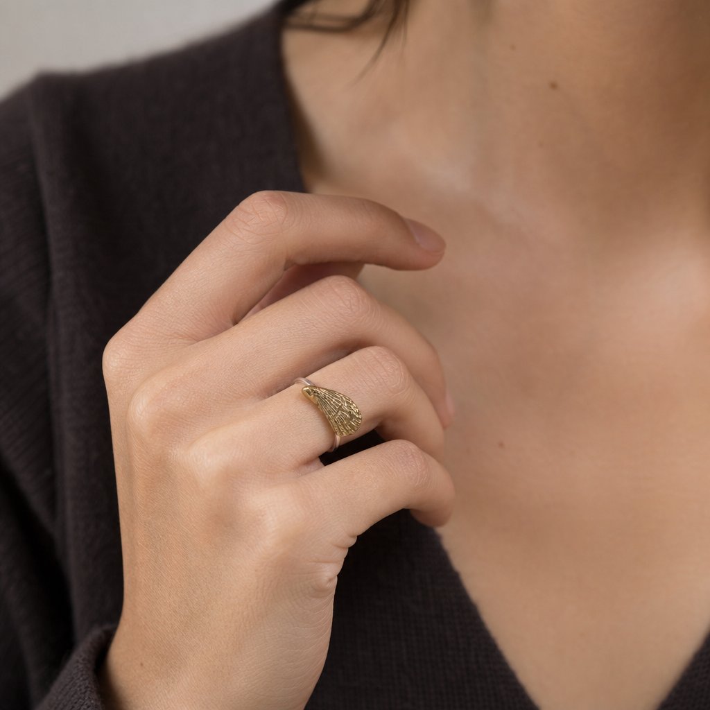 Brass Black Mussel Shell Ring - side angle showing sterling silver band and brass shell contrast, Natasha Wood Jewellery
