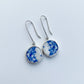 Customisable Vintage China Silver Earrings - flat-lay on antique blue floral porcelain plate, sterling silver bezels