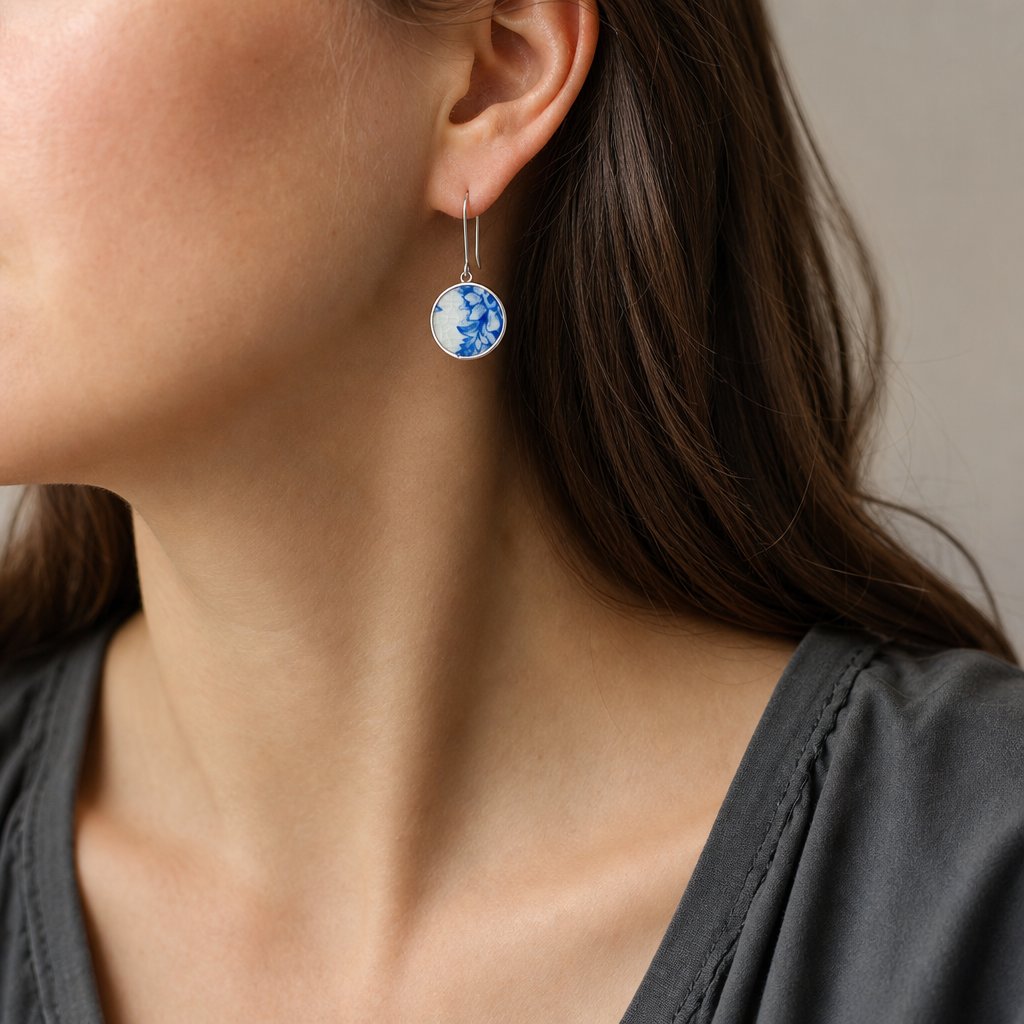 Customisable Vintage China Drop Earring - on-model close-up, antique blue floral porcelain set in sterling silver bezel