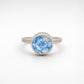 Ceramic Flower Ring from Antique Plate - front view on wooden ring cone, sterling silver bezel setting