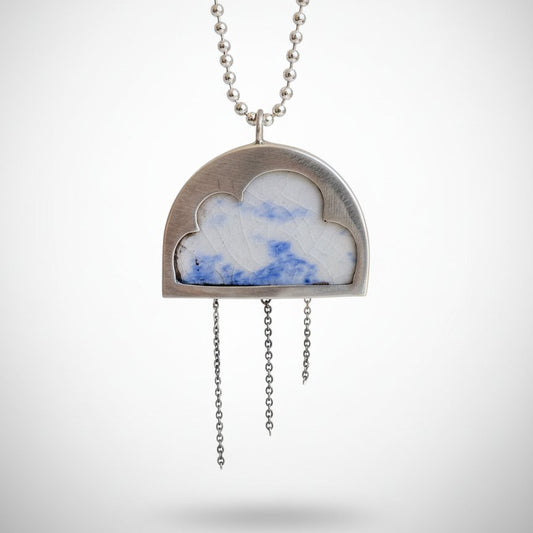 Cloud Pendant - front view, sterling silver with antique blue and white ceramic inlay and hanging chain details