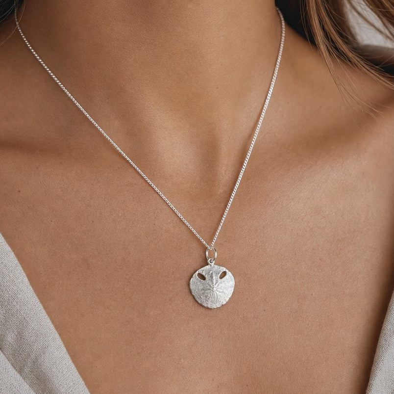 Small Pansy Shell Pendant - centred front view, solid sterling silver matte finish