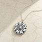 Daisy Flower Pendant - close-up of shiny sterling silver petals and textured centre detail