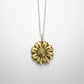 Daisy Flower Pendant - shiny sterling silver on light blue background, handmade by Natasha Wood