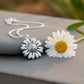 Daisy Flower Pendant - shiny sterling silver on light blue background, handmade by Natasha Wood