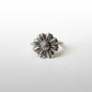 Daisy Flower Ring - front view brass, warm golden tone with textured pollen centre detail