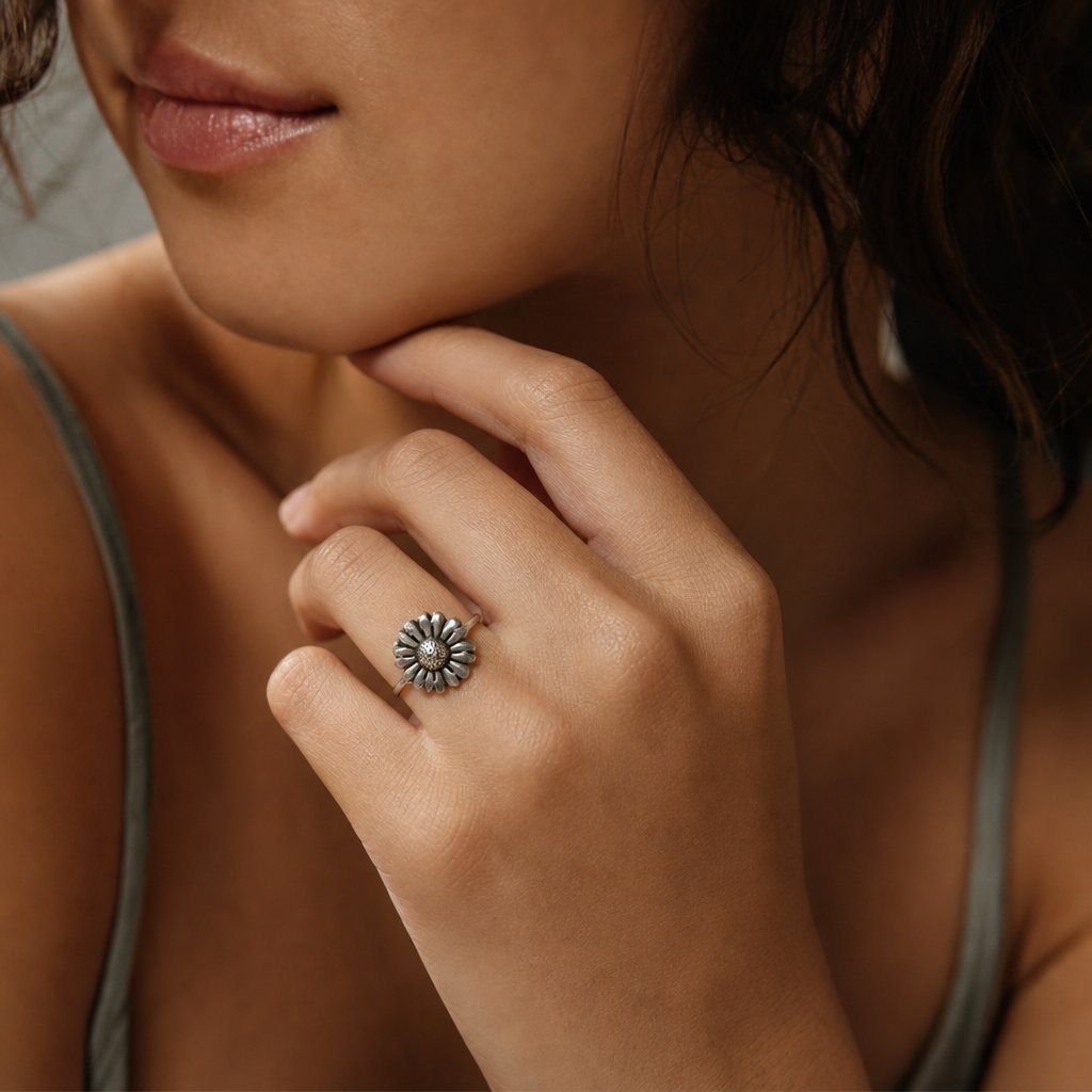 Daisy Flower Ring - elevated angle plain sterling silver, showing petal depth and hammer-textured centre