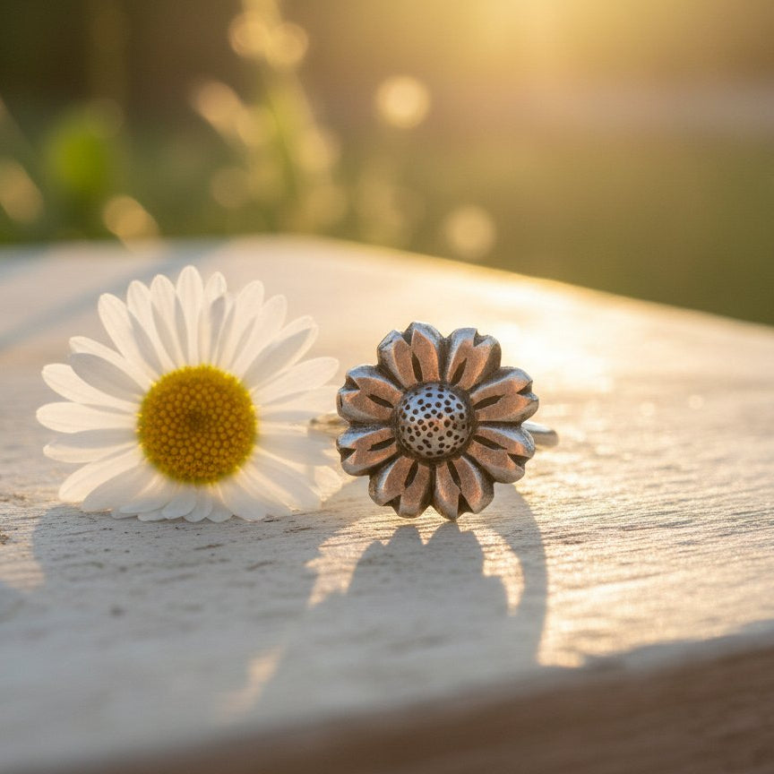 Daisy Flower Ring - front view plain sterling silver, polished band and textured flower centre