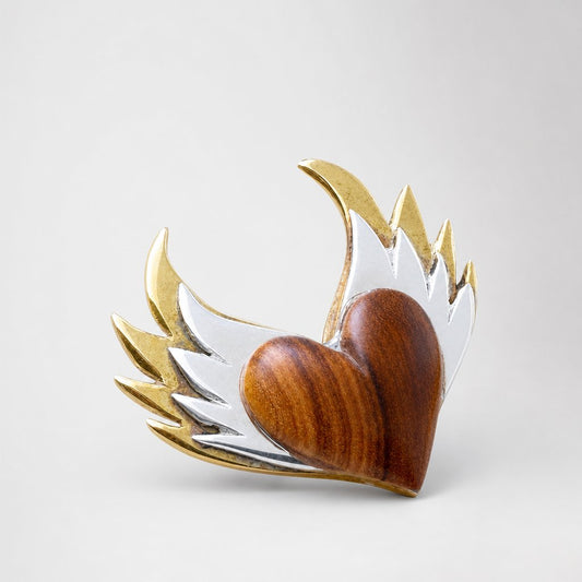 Olive Wood Heart Pendant with Double Layered Sterling Silver and Brass Wings - flat lay hero shot on wooden surface