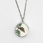 Reversible antique china shard pendant - front face hand-painted floral pattern in sterling silver bezel
