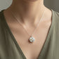 Double Bloom Shard Pendant - profile view showing depth of sterling silver bezel with antique blue and yellow floral china