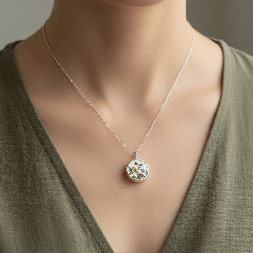Double Bloom Shard Pendant - profile view showing depth of sterling silver bezel with antique blue and yellow floral china