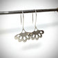 Five-Petal Lotus Hook Earrings - flat lay detail view sterling silver brushed finish