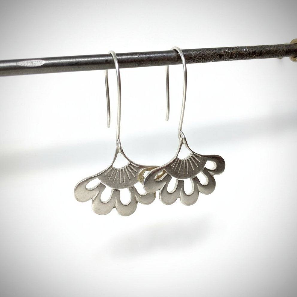 Five-Petal Lotus Hook Earrings - flat lay detail view sterling silver brushed finish