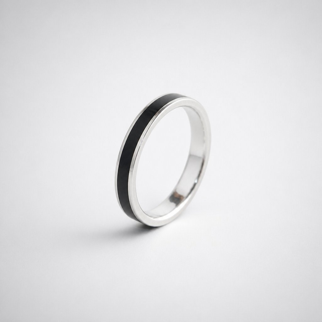 African Blackwood and sterling silver men's band ring - narrow 4mm variant showing fine wood stripe and polished silver edges