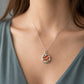 Golden Lotus Bloom pendant - front view orange lotus ceramic set in sterling silver bezel with trace chain
