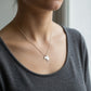 Heart Cape Town Africa Pendant - front view sterling silver with heart cut-out on branded card