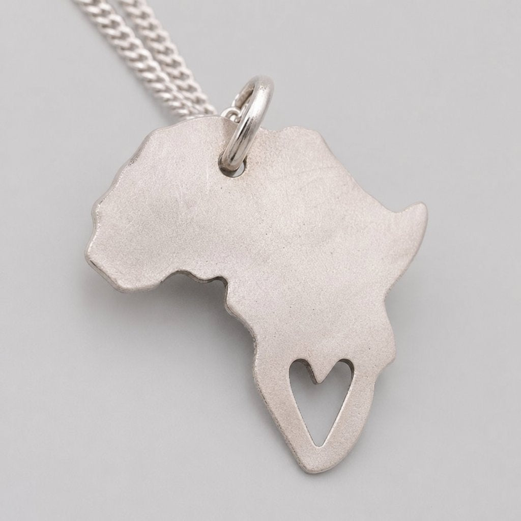 Heart Cape Town Africa Pendant - front view sterling silver with heart cut-out on branded card