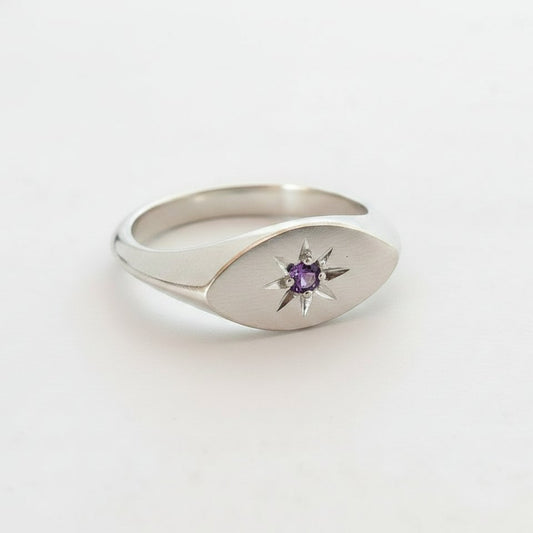 Ladies Pinky Signet Ring - hero front angle, sterling silver with blue topaz star setting