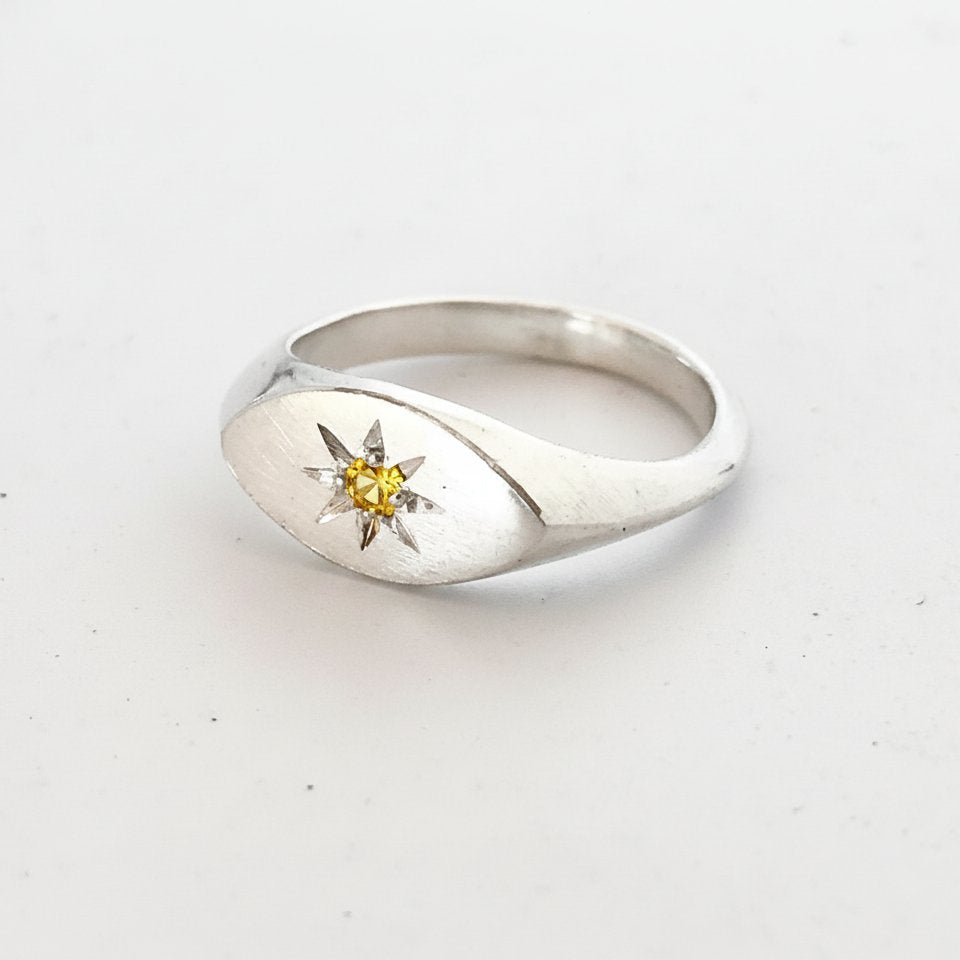 Ladies Pinky Signet Ring - three-quarter angle, sterling silver with citrine star setting