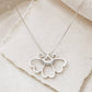 Large 3-Petal Flower Sterling Silver Pendant - on model lifestyle shot, worn with floral dress