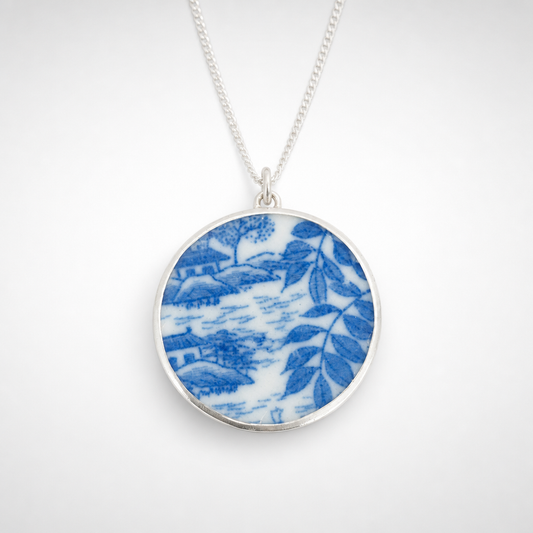 Light Blue & White Willow Pattern Antique Ceramic and Sterling Silver Pendant - front view blue floral motif