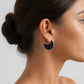 Moon Stud Earrings with Olive Wood - on model close-up showing crescent sterling silver frame and african black wood 