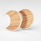 Moon Stud Earrings with Olive Wood - flat lay pair showing crescent shape and natural wood grain with sterling silver bezel