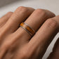 Olive Wood & Sterling Silver Ring - angled hero view showing wood grain and silver band