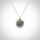 Silver Protea Disc Pendant - side profile view showing disc thickness and handcrafted edge on sterling silver chain