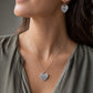 Handcrafted Protea Heart Hook Earrings - flat lay product shot sterling silver etched detail