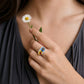 Raised antique ceramic and sterling silver ring - front face view, blue and yellow daisy floral motif
