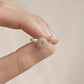 Sea Urchin Ring - brass sea urchin shell motif on sterling silver band, flat lay front view