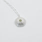 Large Sterling Silver Sea Urchin Pendant with Blue Topaz hanging on satellite chain - suspended shot gradient background