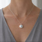 Large Sterling Silver Sea Urchin Pendant with Blue Topaz gemstone on curb chain - front view