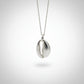 Sterling Silver Cowrie Shell Pendant - close-up detail showing lost wax cast texture, white background