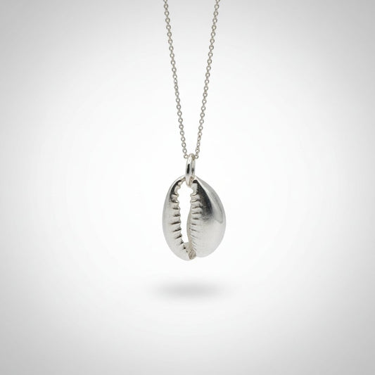 Sterling Silver Cowrie Shell Pendant - close-up detail showing lost wax cast texture, white background