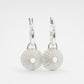 Silver Urchin Charm Hoop Earrings - front view textured sterling silver charms on display rod