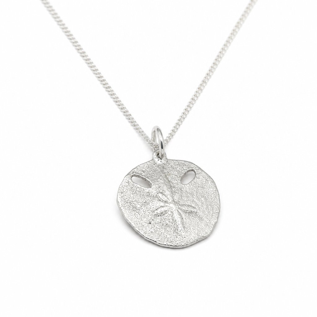 Small Pansy Shell Pendant - angled hero shot, solid sterling silver on curb chain