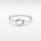 Sterling Silver Knot Ring - flat lay product shot, polished silver wire