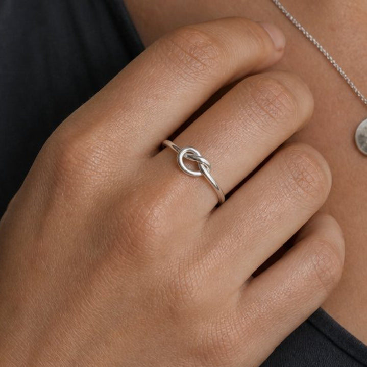 Sterling Silver Knot Ring - stacked with other silver rings, handmade ring stack by Natasha Wood Jewellery