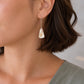 Tuscan Fine English Bone China Windsor silver earrings on a model