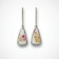 Broken china tea cup drop earrings - sterling silver setting with Tuscan Windsor floral bone china - displayed on antique tea cup