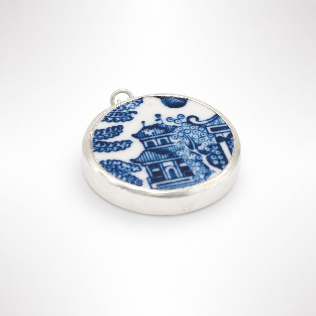 Handmade Willow Pattern sterling silver pendant necklace on white background - Natasha Wood Jewellery