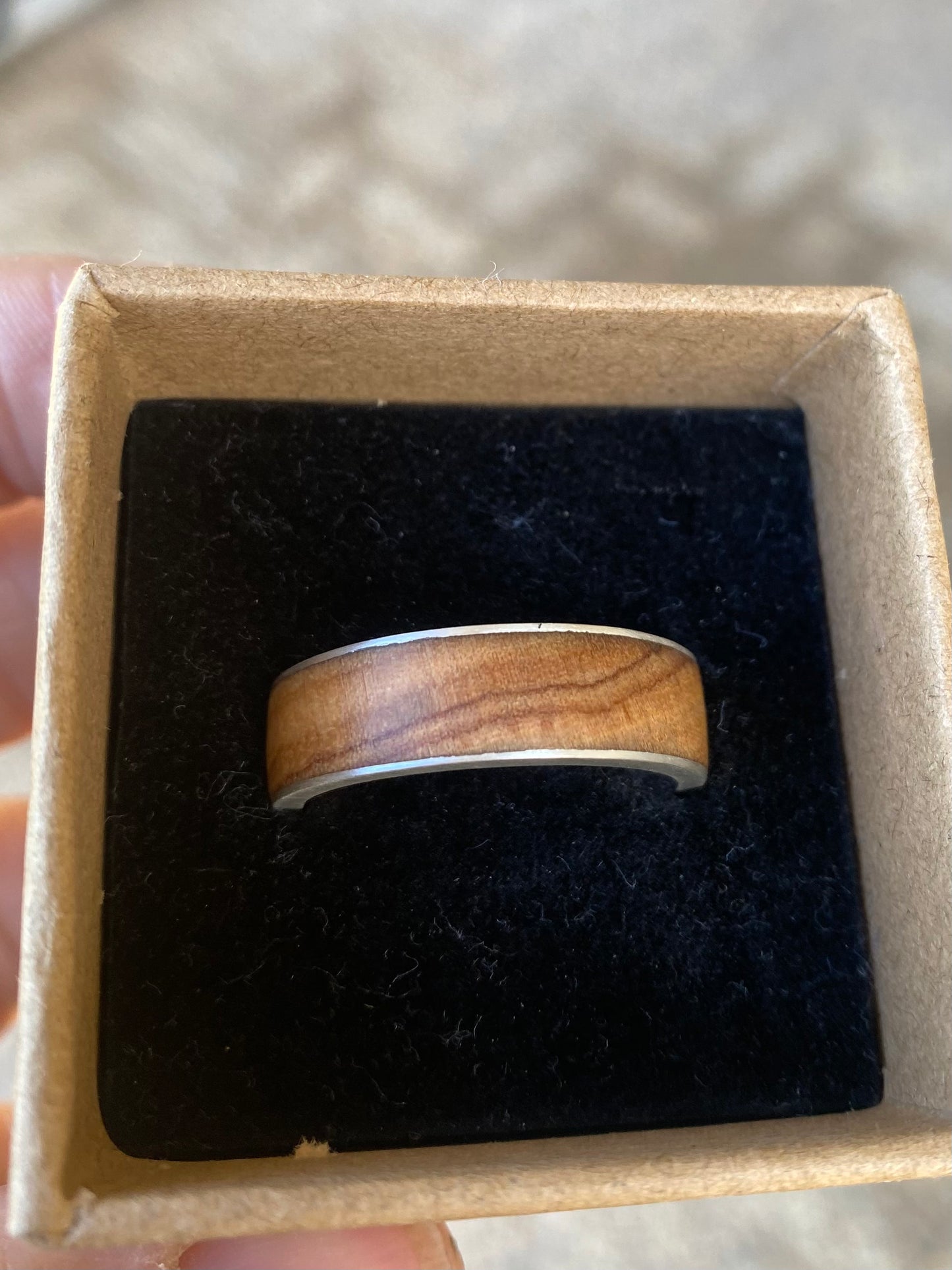 Olive wood with thin silver sides