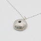 Extra Large Sea Urchin Pendant - close-up detail shiny silver textured surface