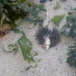 Tulip Conch Necklace - sterling silver shell pendant in coastal rock pool with sea urchin