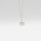 Small Sea Urchin Necklace - sterling silver sea urchin pendant on white gradient background, front view