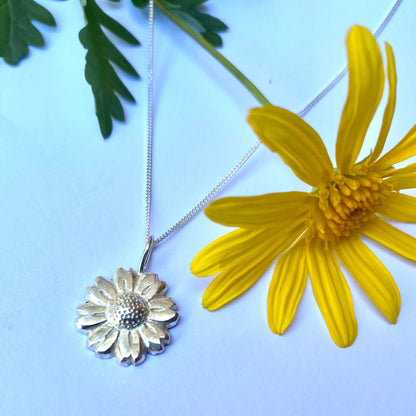 Daisy Flower Pendant - worn on model showing pendant sitting at collarbone on 45cm sterling silver chain